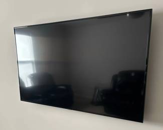 Samsung inch Smart TV with sound bar and stand mount, and sub woofer second image