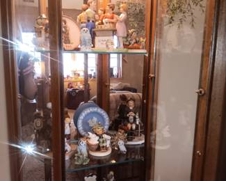 Hummels, Norman Rockwell figures, Swarovski crystal owl