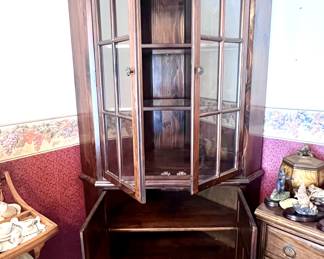 Excellent corner curio and dinnerware cabinet