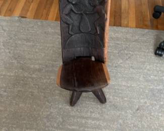 African Hand-Carved Wooden Palaver Chair with Figurative Relief