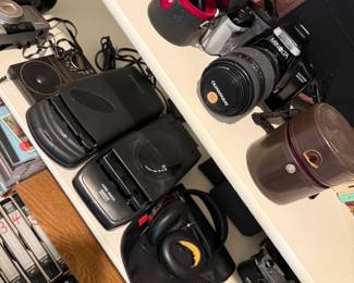 LOTS OF VINTAGE CAMERAS, RECORDERS, TAPES, LENS