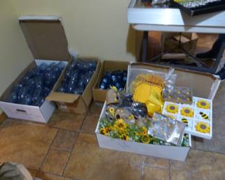 Lots of plastic blue glasses & blue candle holders, bumblebee partyware