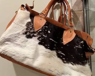 Cow hide duffle bag