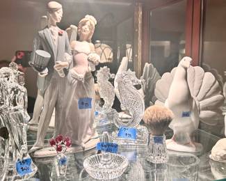 Waterford 7.5” bride & groom $40, 7” Seahorse $75, ring holder $25, makeup brush $10
LLADRO Bride & Groom $75, Turkey $45, Child w/ lamb $25, Swarovski vase with red roses $40