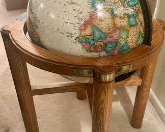22” round x 23”h floor globe with wood frame. Brass accents $145