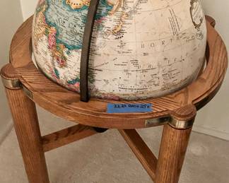 22” round x 23”h floor globe with wood frame. Brass accents $145