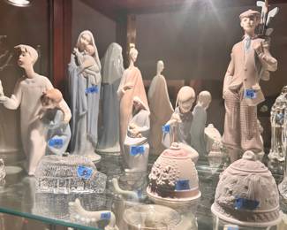 Lladro vintage golfer $60, Shepard boy $35,
Holly family $50, Holy mother & child $60, nighshirt brothers $50, 1987 & 1995 Christmas bells $15ea, Waterford castle $40, Irish cottage $35, Holy mother & child $35