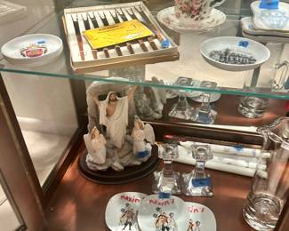 Jesus & the angels $50, maxim’s tiny plates $15ea
Orrefor Taper candle holder set $50