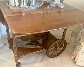 Vintage solid wood tea cart w/ wheels $145
32” x 19 x 39h. (42” when side flipped up)