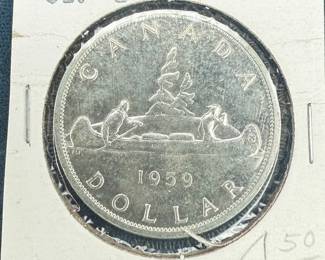 Canadian onedollar silver coin, dated 1959, featuring the Voyageur design.