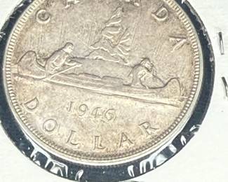 Canadian onedollar silver coin, dated 1946, featuring the Voyageur design. 
