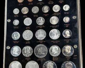 Collection of U.S. 20th century type coins in a display holder.