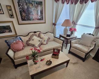 Antique-style Victorian settee and armchair set in a light-colored upholstery
Marble-top Coffee and End Tables

