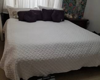 King size sleep number bed with linens and pillows