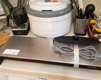 Kitchen items and food warmer tray.