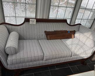 Empire style paw-footed upholstered sofa in great condition