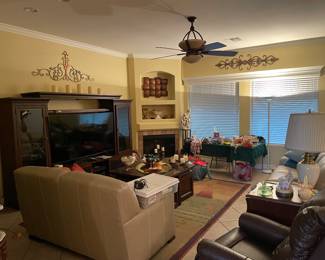 Leather sofa & loveseat, leather recliner, entertainment unit, artwork