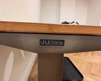 4 uplift desks all can be raised to 38" or lowered to 28"