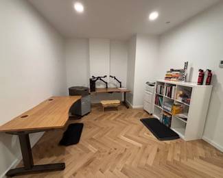 New electric Uplift desk, Books and storage shelves