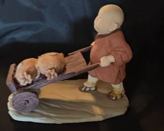 Monk Pushing Cart with Sacks Figurine second image