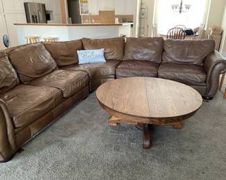 leather sectional , might recline?, coffee table