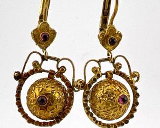 Pair of 14kt dangle textured balls with garnets