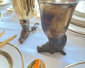 these are brass stag coblets, we have 8, 4 one pattern, 4 another pattern