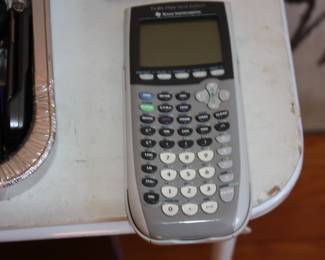 Vintage TI-84+ silver calculator
