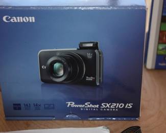 Canon Power Shot SX210 IS in box