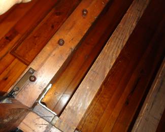 The knobs were for the rope bottom bed which was later converted to a slat bottom bed.