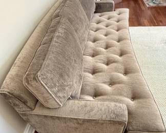 Beautiful and Comfortable Gray Sofa with One Cushion and slight curve and tufted 