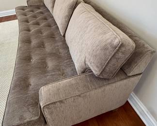 Beautiful and Comfortable Gray Sofa with One Cushion and slight curve and tufted 