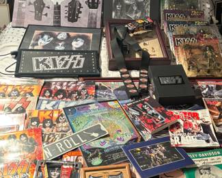 Large assortment of kiss memorabilia, vinyl records, signed posters