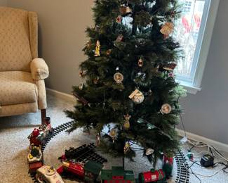 Large artificial tree with holiday train