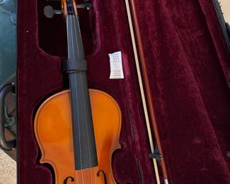 Vintage student violin with case and bow