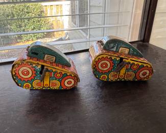 Pair metal wind up tanks