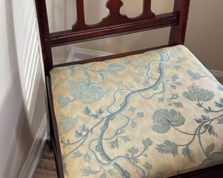 One of a set of dining room chairs