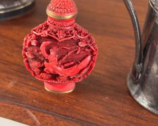 Carved perfume bottle