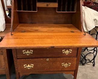 F41. Tilt Top Oak Desk-3 Drawers									31” x 16” x 46”