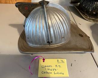 12. Cairns - Unpainted - “MRFD” Embossed - Size 7 - Cushion Lining - No Shield