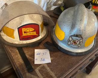 37. No Markings - Silver Sparkle - Size Unknown - Leather Inside
38. Cairns - White - “Asst Chief Damascus Vol Fire Dept” - Size Unknown