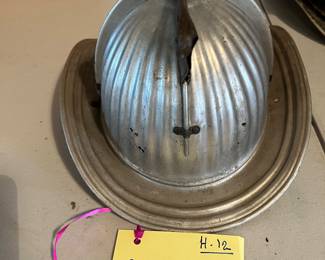 12. Cairns - Unpainted - “MRFD” Embossed - Size 7 - Cushion Lining - No Shield