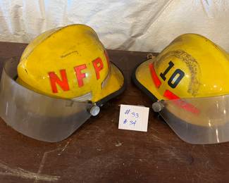 33. Cairns Bros - Yellow - “10” - Size Unknown - Chin Strap - No Shield
34. Cairns Bros - Yellow - “NFPA” - Size Unknown - Chin Strap