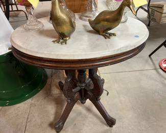 F43. Oval Marble Top Side Table									29” x 21” x 29”