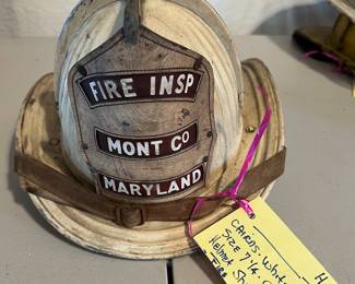 8. Cairns - White “FIRE INSP  MONT CO
MARYLAND” - Size 7 ¼ - Chin Strap- Helmet Shroud