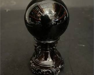Black Crystal Ball On Decorative Stand