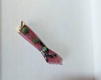 18k gold piece. Ask cashier to see piece, if interested.