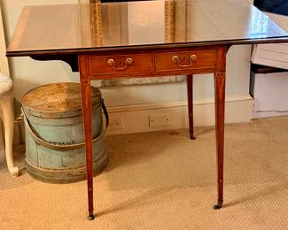 George III Inlaid Pembroke Table. Drop leaf top with square tapering legs; brass cuff; casters.