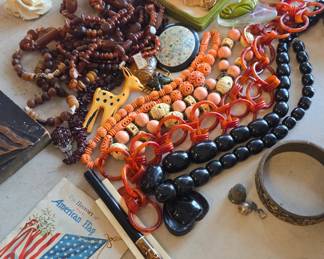 vintage lucite, bakelite, amber, costume jewelry,