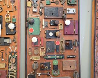 absolutely amazing vintage lock and key collection., from Girard Butler. these were made circa 1920 and the actual boards are in the photo album along with other collections Girard Butler collected. we will be selling them by the board, many of the locks have tags and dates from where they came even a lock from the 12th President Zachary Taylors home.  boards are roughly 6ft long !